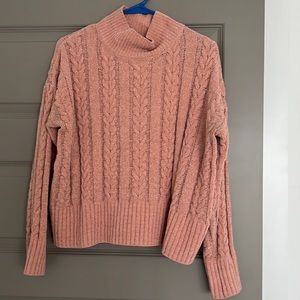 Pink turtleneck crop top sweater